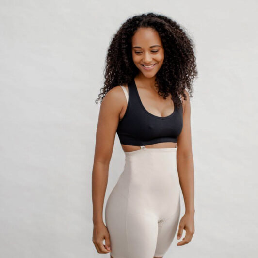 Mom wearing a high-waist postpartum recovery compression garment